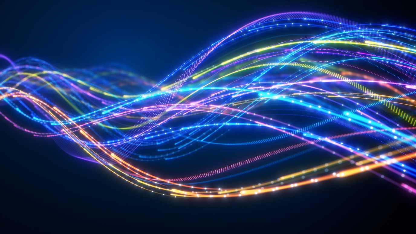 Abstract blue light streams representing video data moving through an AI-enhanced, standards-based software workflow.