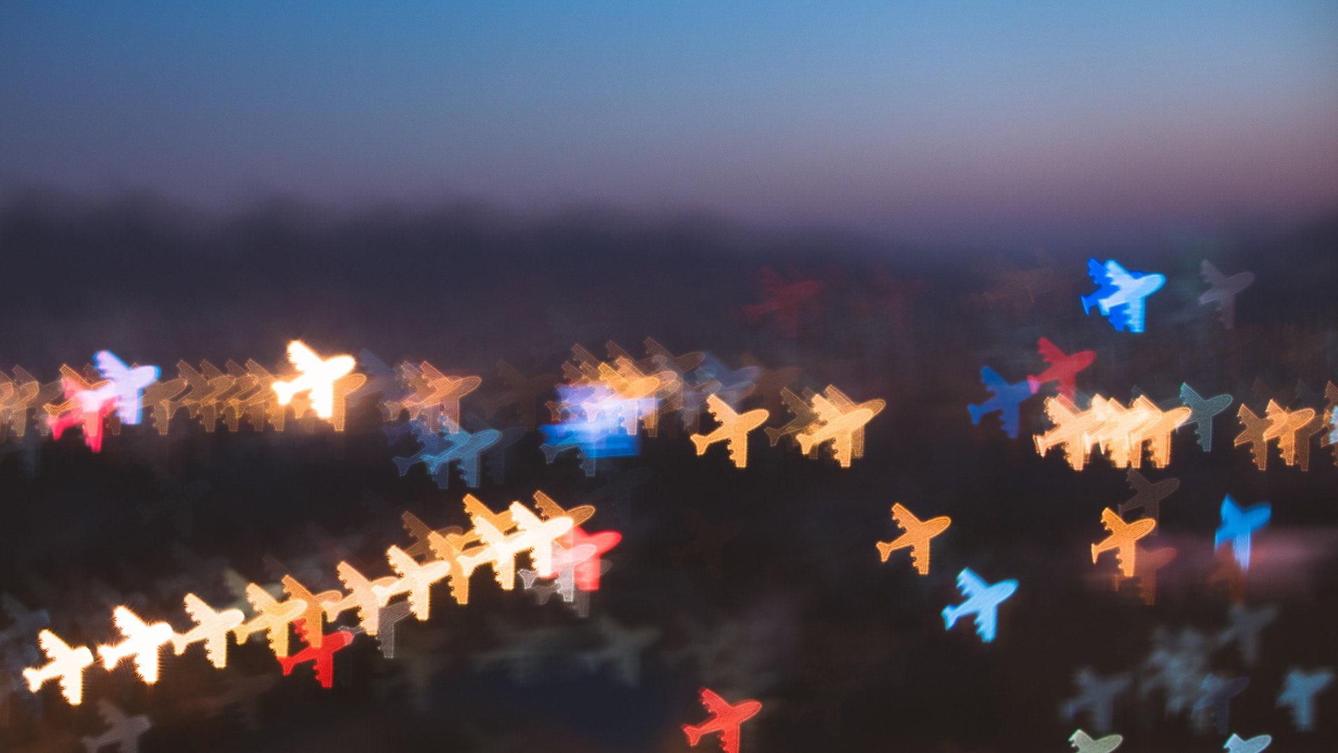 Multicolored lights in the shape of planes