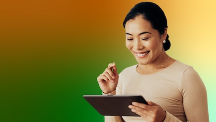 Woman looking at tablet device