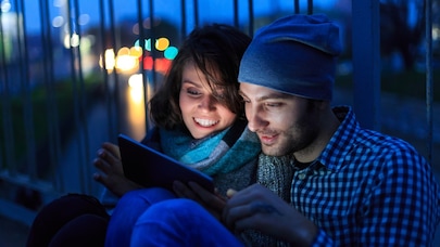couple looking into mobile