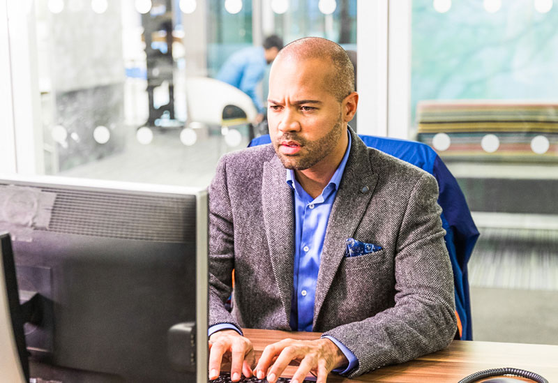 man at computer