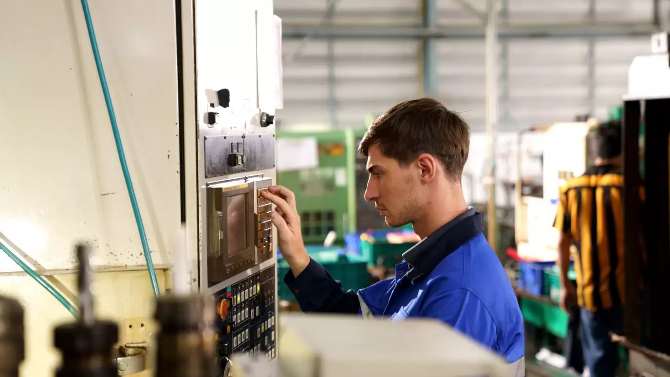 man working on machine