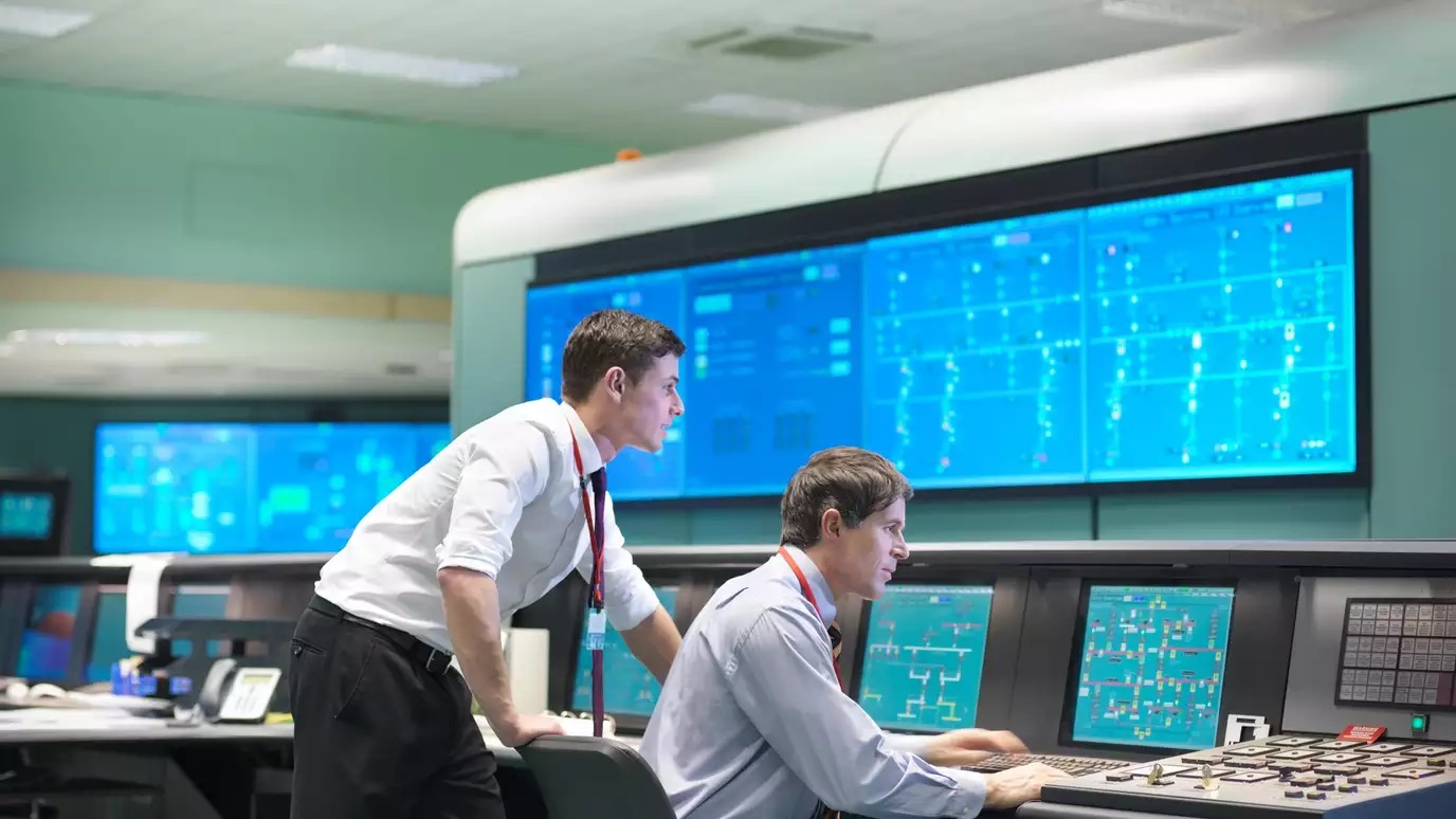 two people working