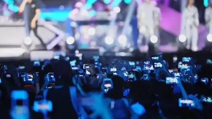 crowd with mobile phones