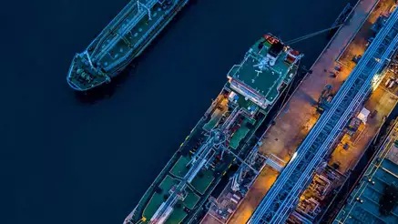 Overhead view of freight ship loaded with containers
