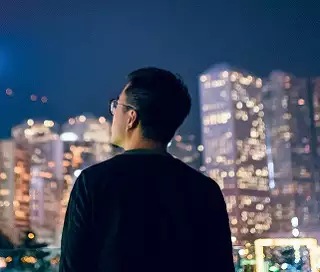 a person looking at buildings