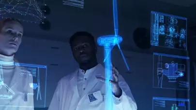 two engineers examine a digital twin of a wind generator