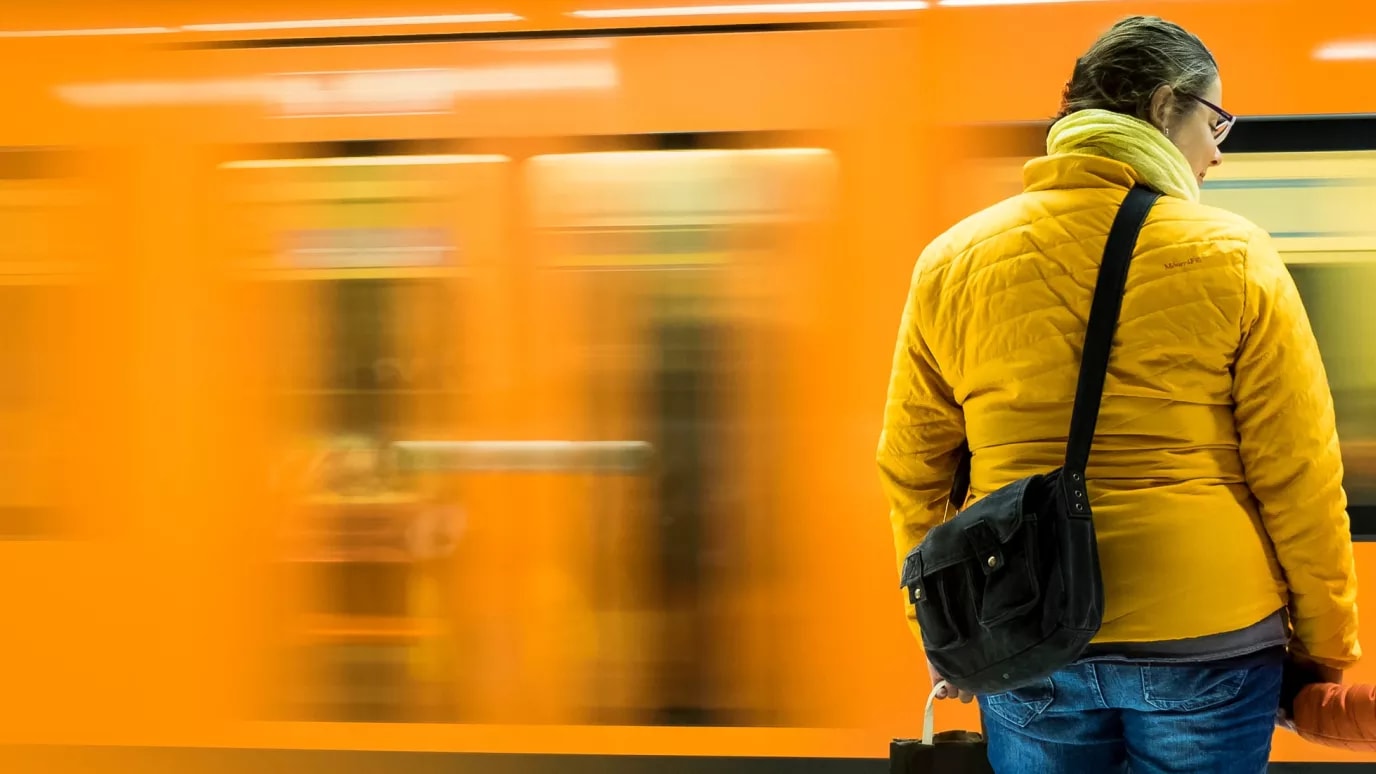 woman and child on train platform