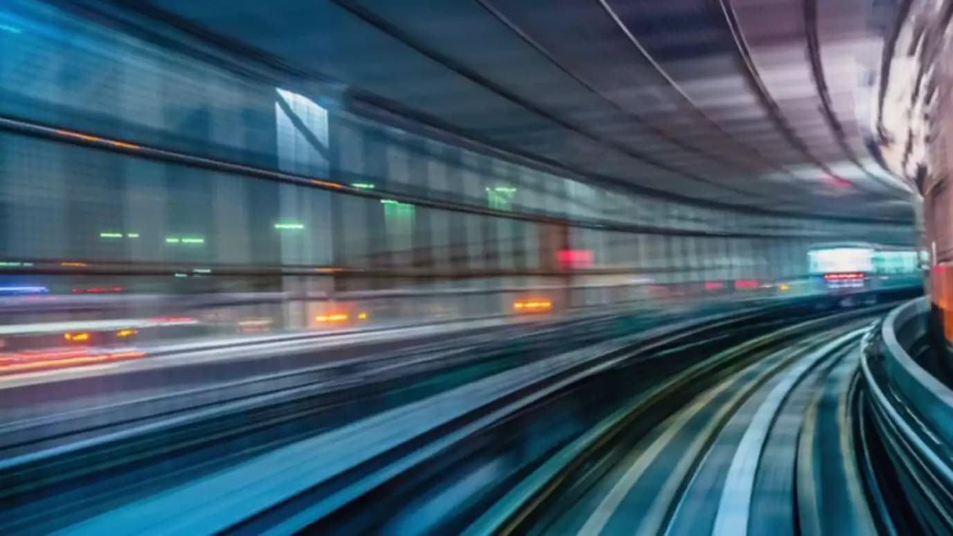 Accelerating bandwidth need illustrated by blurred tunnel from the view of a fast object going through it