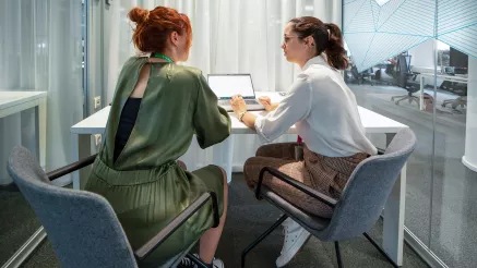 two people working