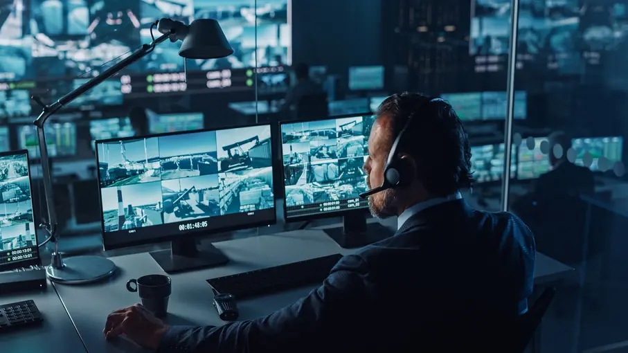A person looking at security footage.