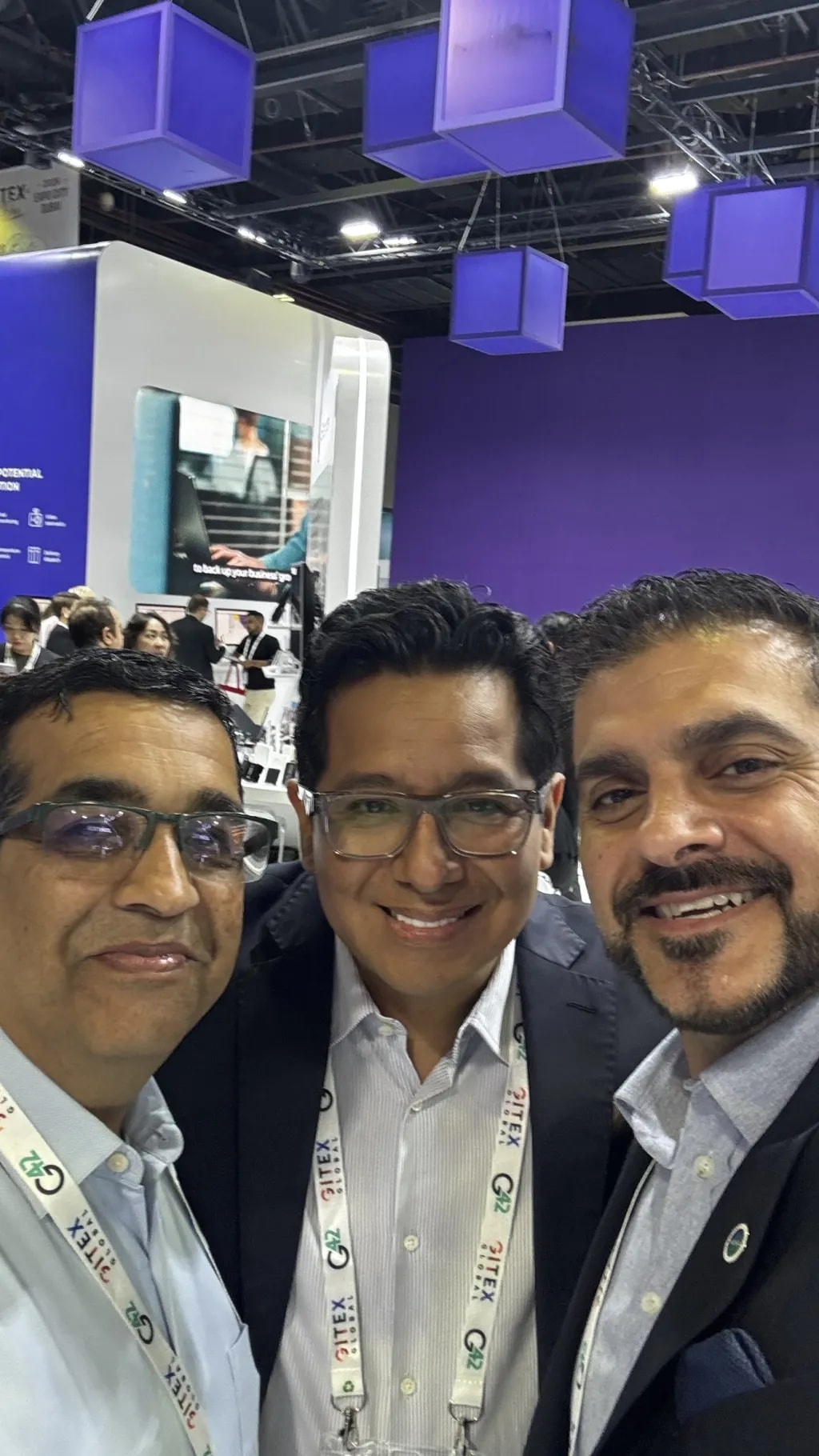 Blog author Ali Emam in a selfie with two industry colleagues