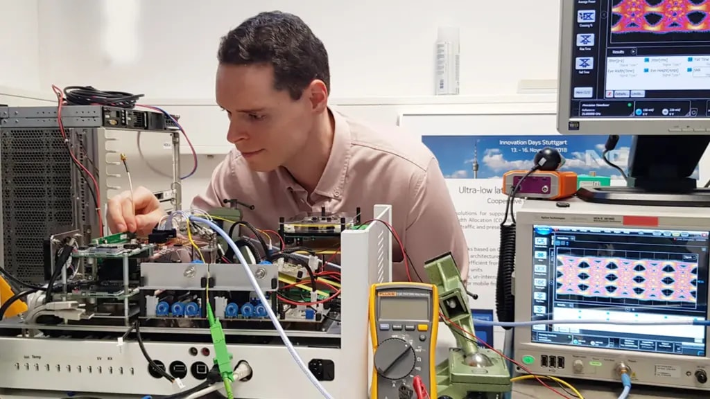 Robert Borkowski working on some electronic equipment