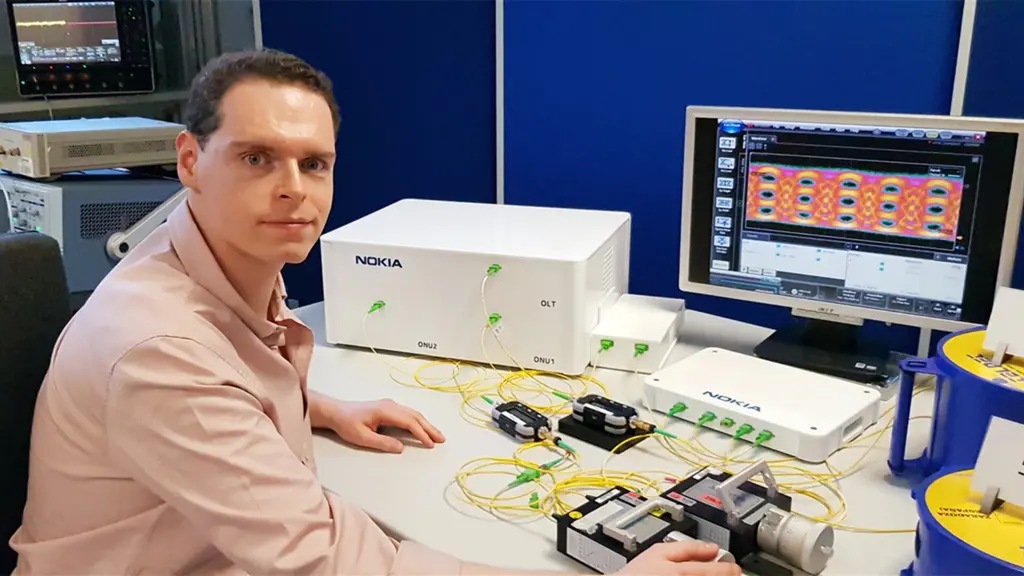 Robert Borkowski working on some network equipment