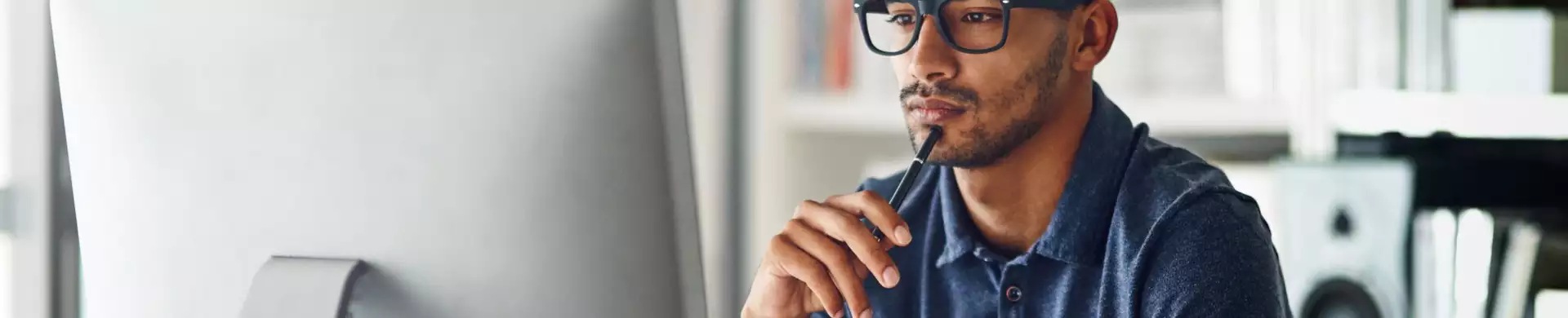 man in front of a computer