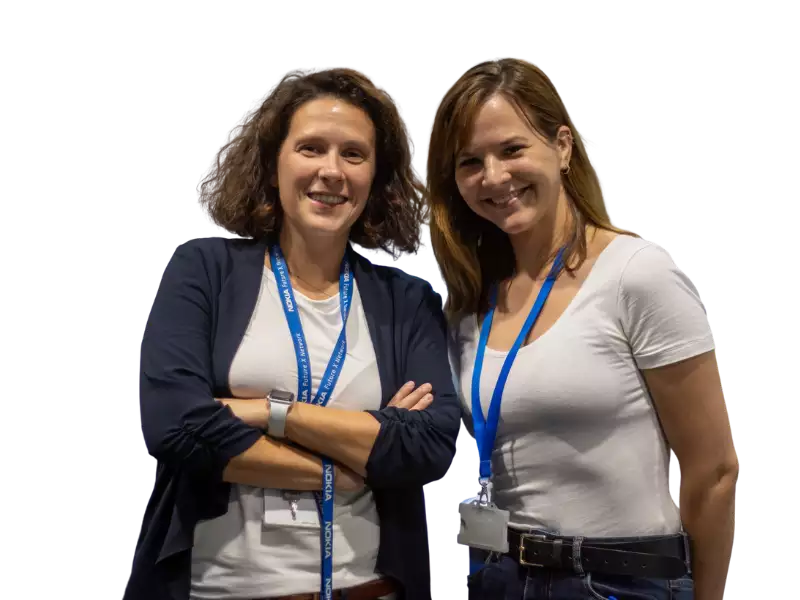 two woman smiling