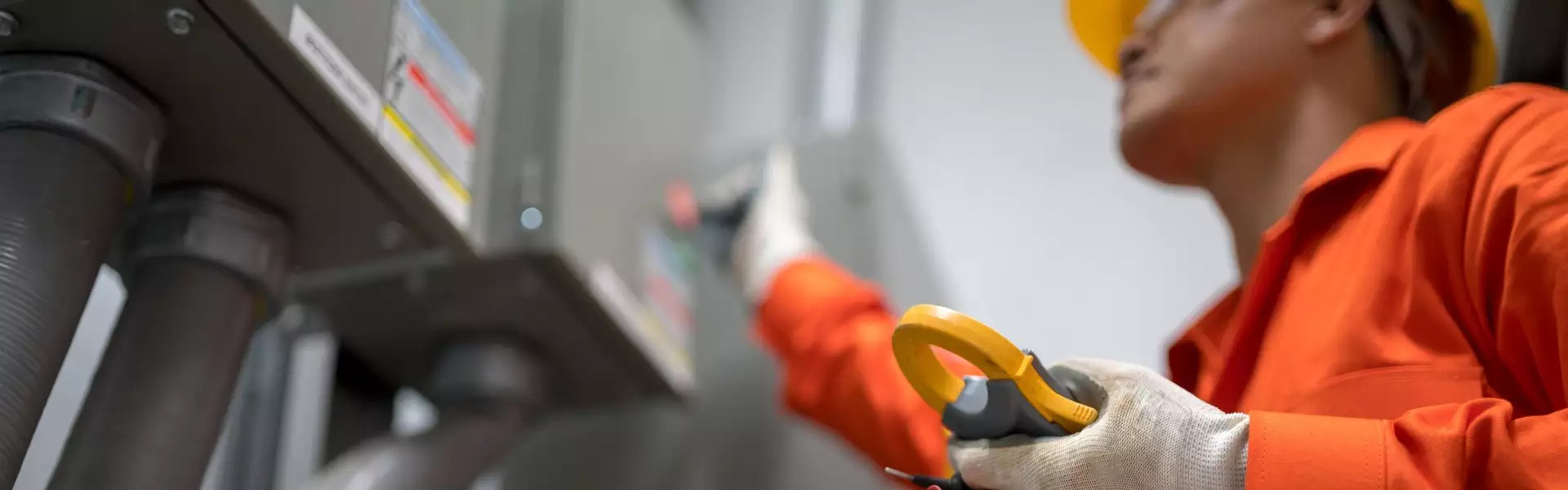 woman standing by a machine