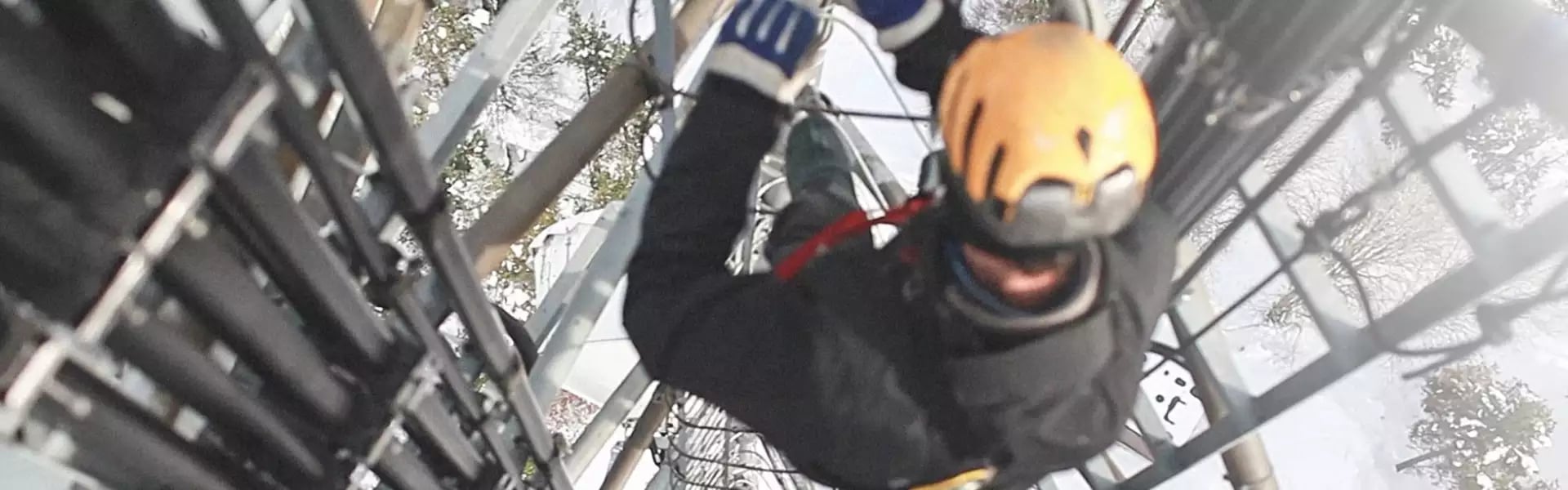 man climbing a mast