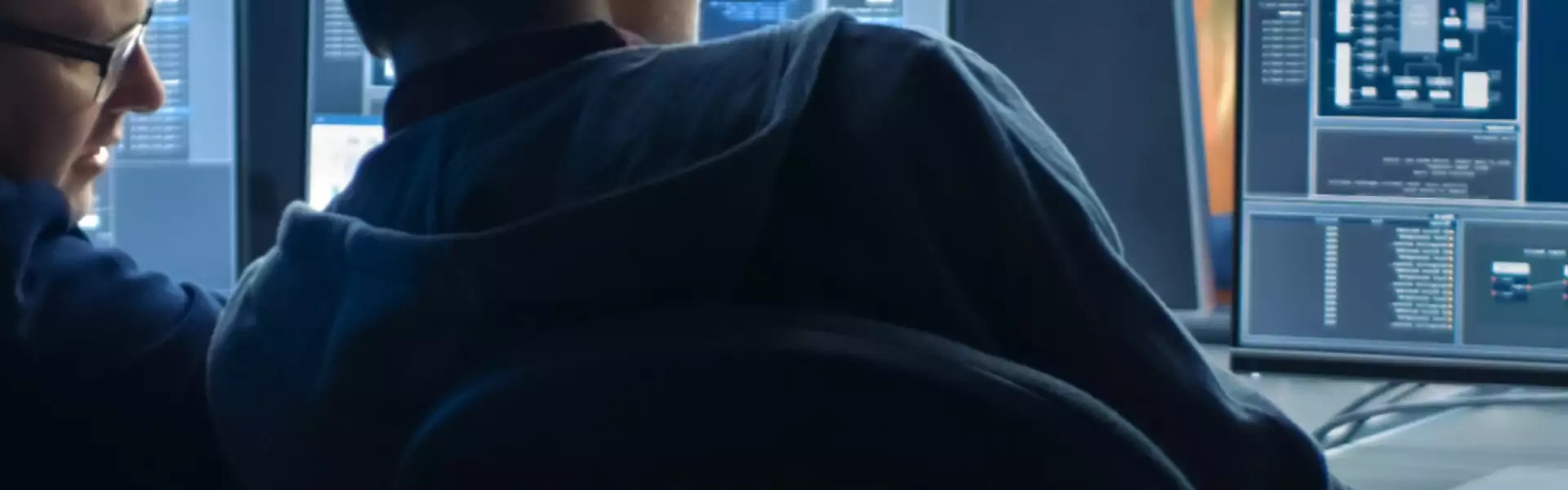 two people working together