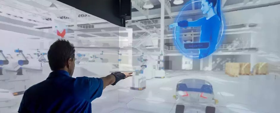 man interacting with an augmented reality factory