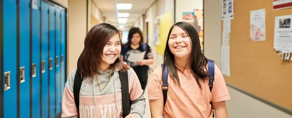 Two indigenous girls in school