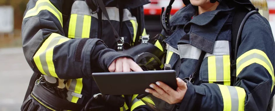 Firefighters using a tablet