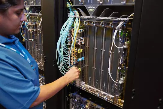 Nokia technicians working on IP routers