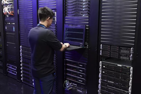Nokia technicians working on IP routers