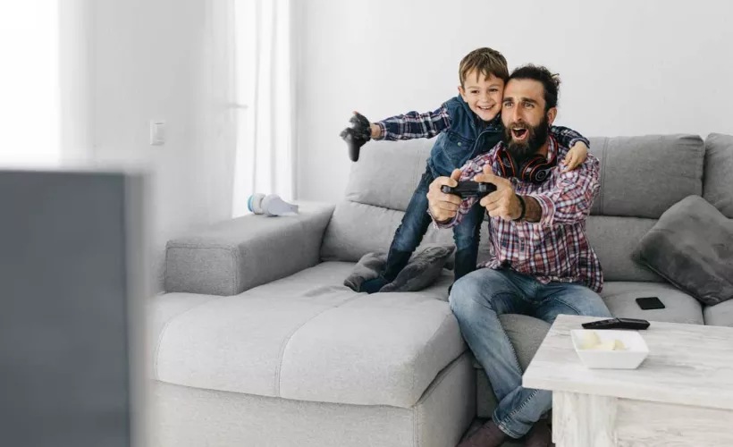 Consumer electronics - Man and boy playing