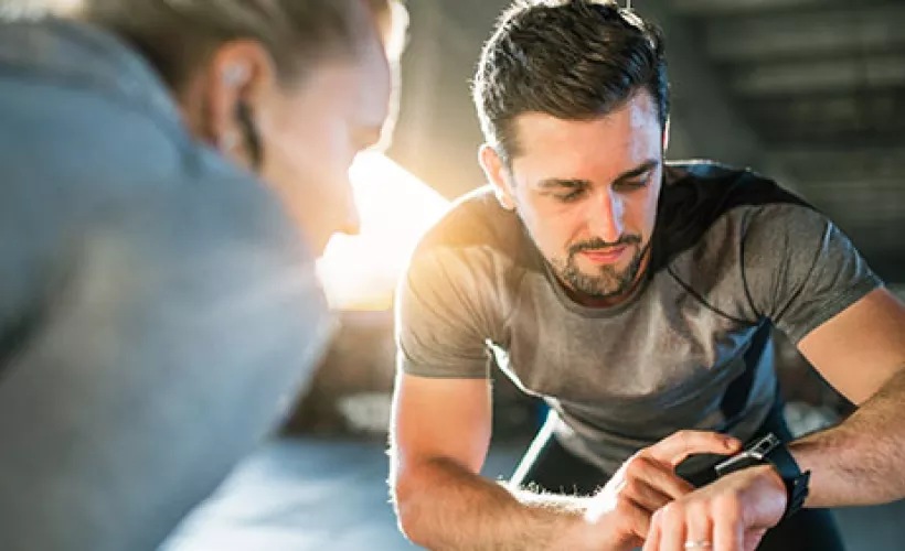 Smart watches - Man showing watch for a friend