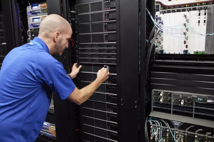 Nokia technicians working on IP routers