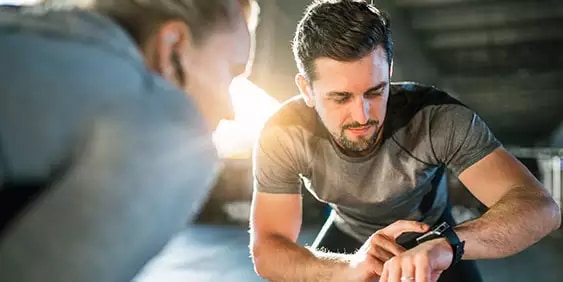 Smart watches - Man showing watch for a friend