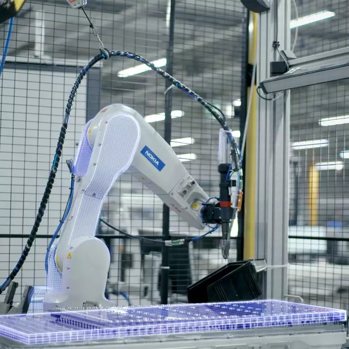 A robotic arm with a holographic digital twin