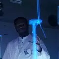 two engineers examine a digital twin of a wind generator