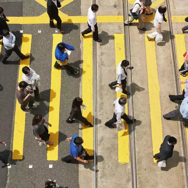 people crossing a street